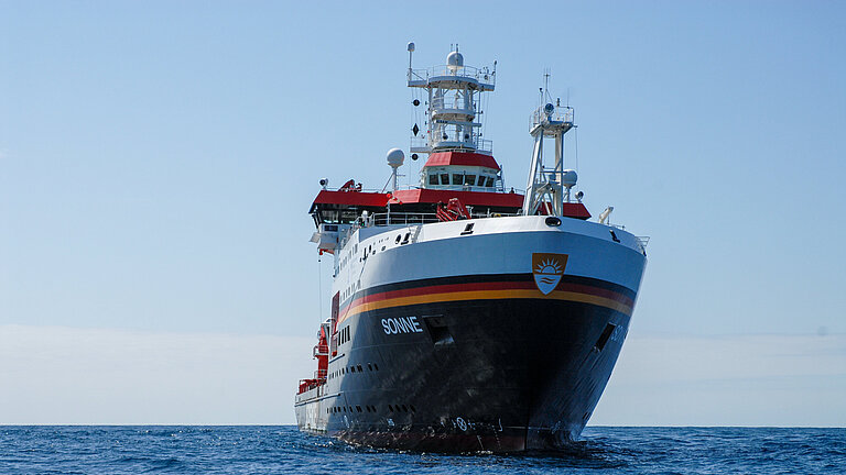  A large research vessel sails towards the viewer